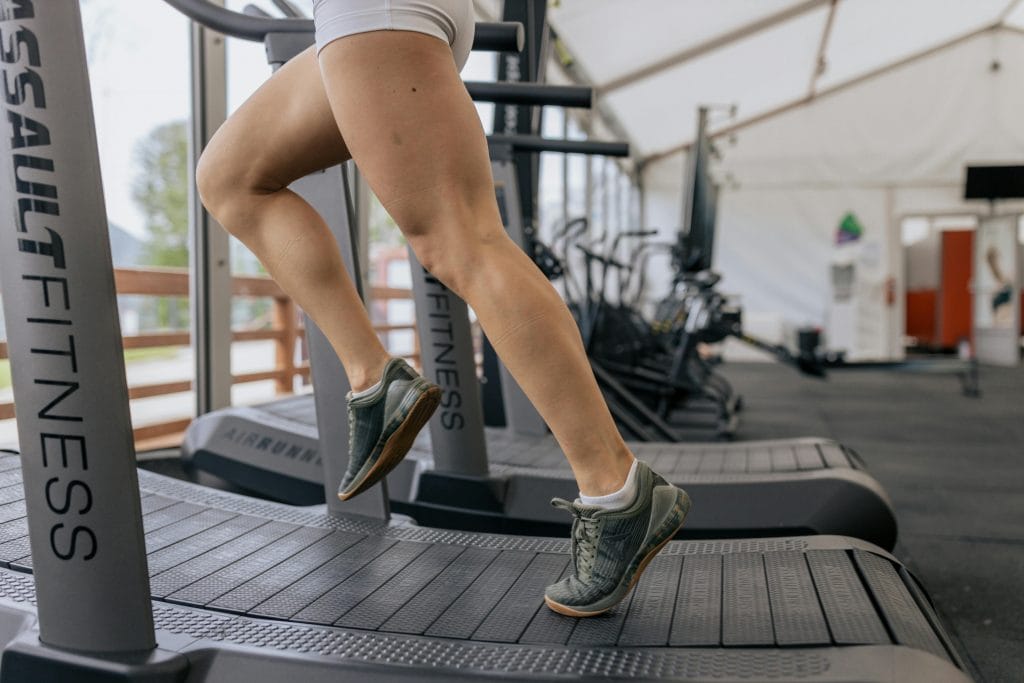 Why a Strong Posterior Chain is Essential for Runners: Runner on a curved treadmill